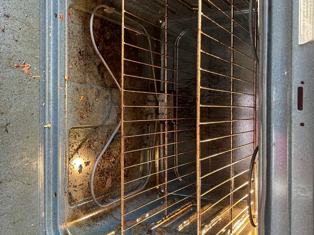 Before: Oven racks and interior walls