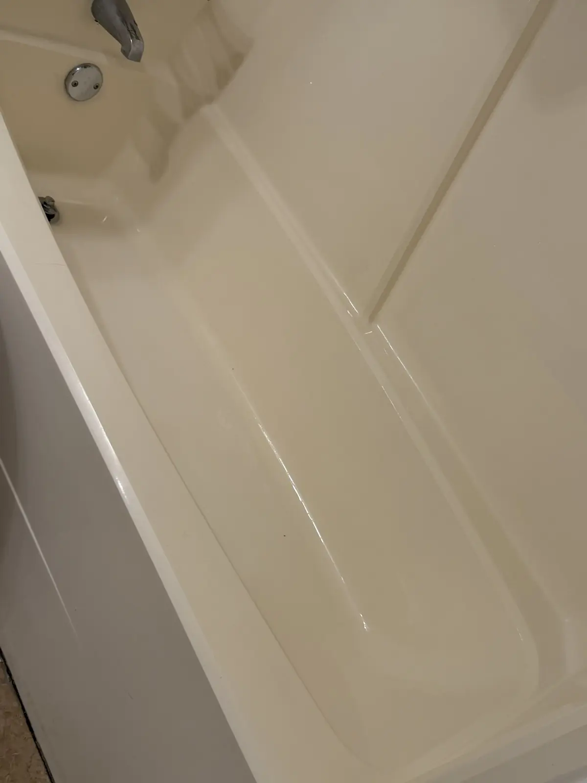 After: A bathtub’s floor, walls and drain