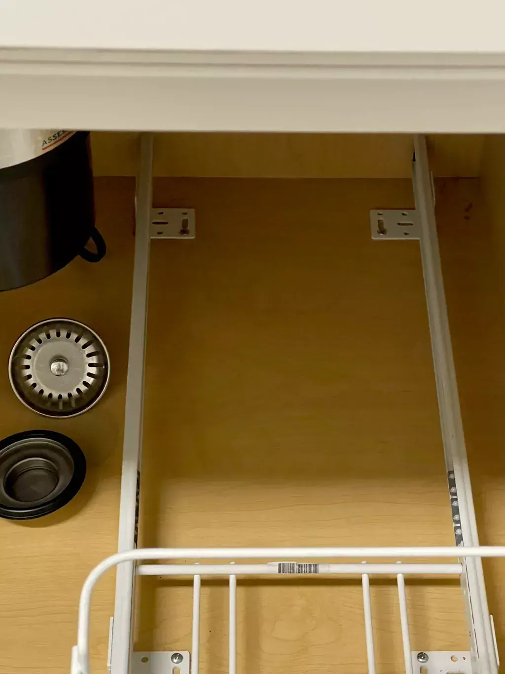 After: Inside of the cabinet under a kitchen sink