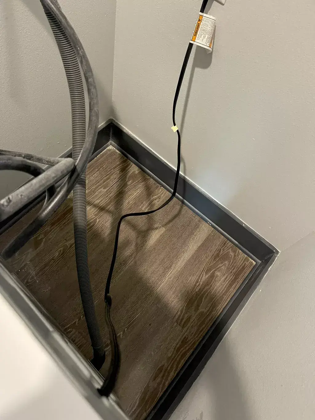 After: Floor pan and walls of a washer nook